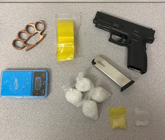 photo of drugs and gun