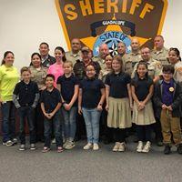 Photo of children with deputies