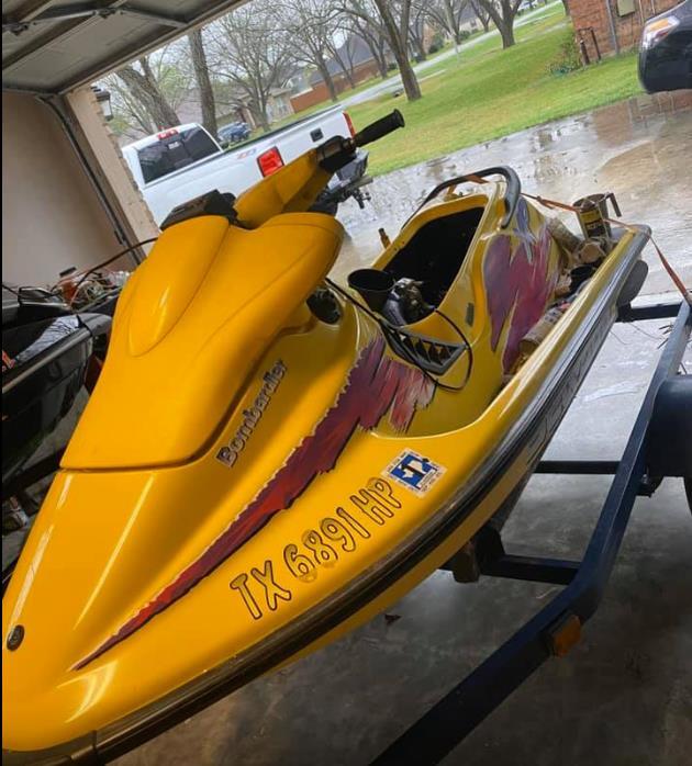 photo of yellow jet ski