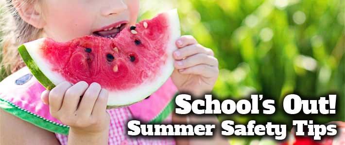 School girl eating a slice of watermelon