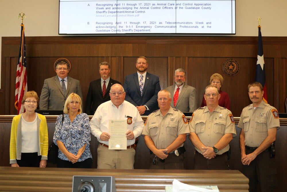 photo of commissioners and animal control officers