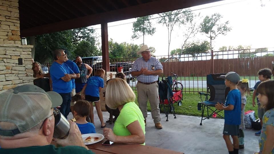 Photo of Sheriff with citizens