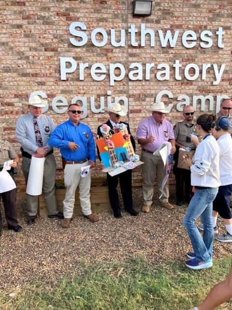 photo of 1st responders and children