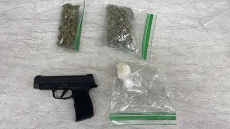 photo of drugs and gun